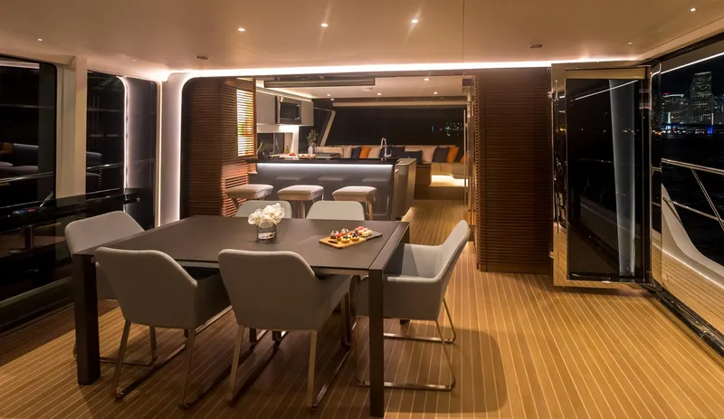  Yacht Photos Pics Luxurious interior of 2022 CL Yachts CLX96 with elegant dining and lounge area.