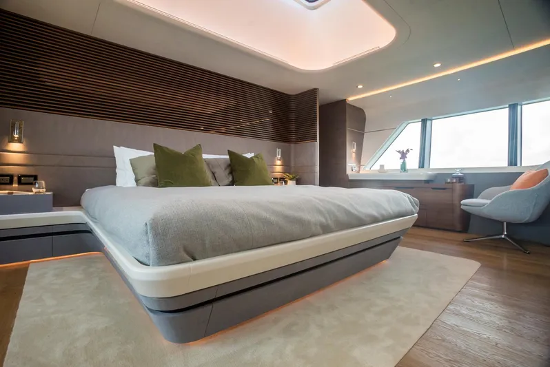  Yacht Photos Pics Luxurious bedroom interior of 2022 CL Yachts CLX96 with modern design and large windows.