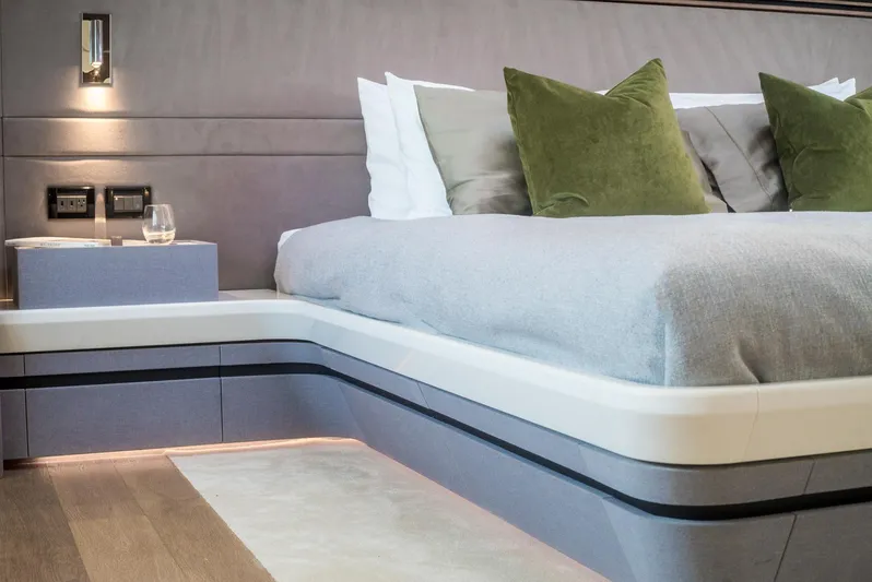  Yacht Photos Pics Luxurious bedroom interior of 2022 CL Yachts CLX96 with modern design and plush bedding.