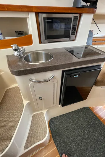 Muffin Yacht Photos Pics Galley. Cooktop, Sink and Fridge