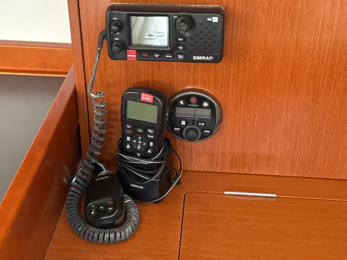 Samba Yacht Photos Pics Simrad marine radio equipment on 2012 Beneteau Oceanis 48 yacht's wooden interior panel.