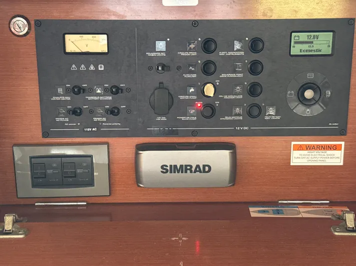 Samba Yacht Photos Pics Control panel of a 2012 Beneteau Oceanis 48 sailboat with Simrad equipment.