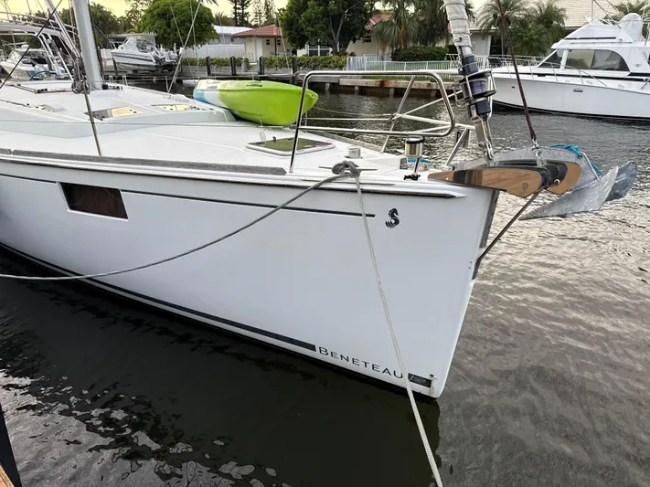 Samba Yacht Photos Pics 2012 Beneteau Oceanis 48 sailboat docked, featuring sleek design and modern amenities.