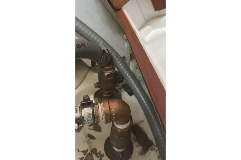 Samba Yacht Photos Pics Plumbing components in a 2012 Beneteau Oceanis 48 yacht interior.