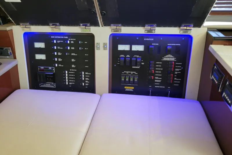  Yacht Photos Pics Control panel of a 2017 Sea Ray Sundancer 460 yacht, featuring illuminated switches.