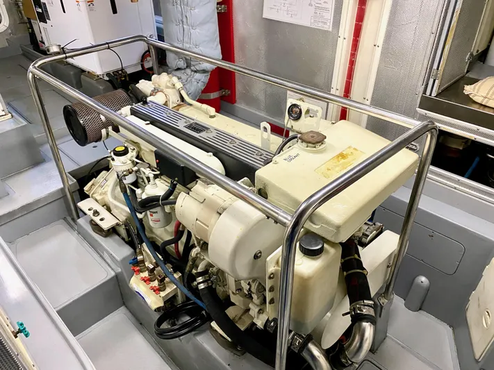 Bunyip I Yacht Photos Pics Engine room of a 2002 Nordhavn 47 yacht, showcasing detailed machinery and components.