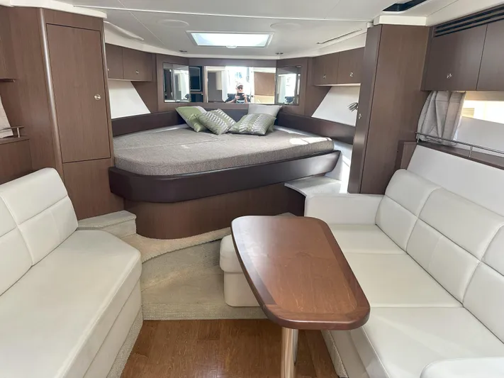 That's Amore Yacht Photos Pics Interior of 2015 Sea Ray 350 Sundancer yacht with modern seating and cozy bed.