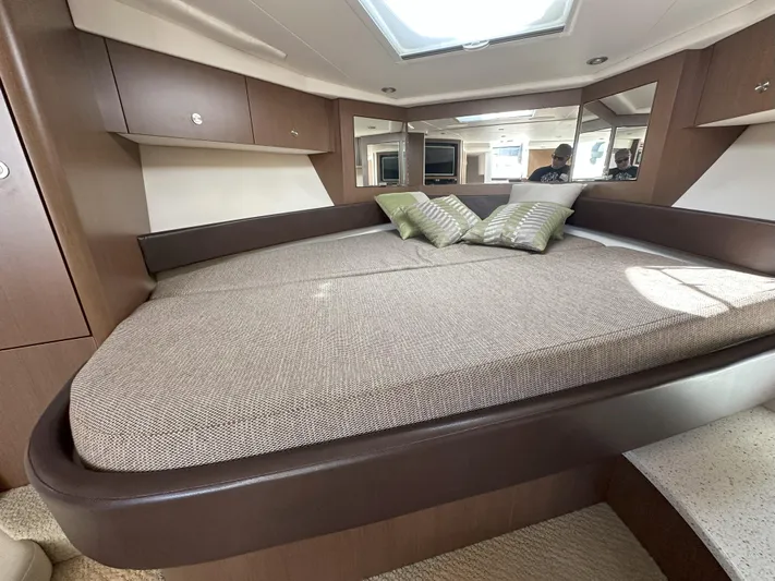 That's Amore Yacht Photos Pics Luxurious interior cabin of 2015 Sea Ray 350 Sundancer yacht with comfortable bedding.