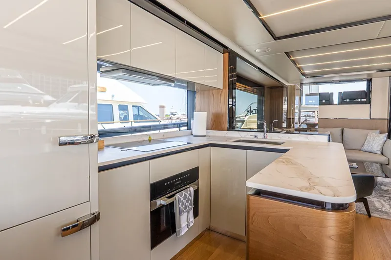 Available Now Yacht Photos Pics Luxurious kitchen interior of 2024 Absolute Navetta 68 yacht with modern design and amenities.