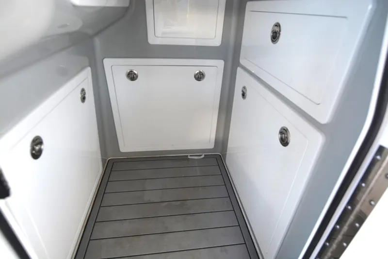 Carolina Bluewater Yacht Photos Pics 2024 Costa Custom Boats 264HC interior storage compartments with sleek design and modern finish.