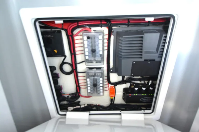 Carolina Bluewater Yacht Photos Pics Electrical panel of 2024 Costa Custom Boats 264HC, featuring wiring and components.