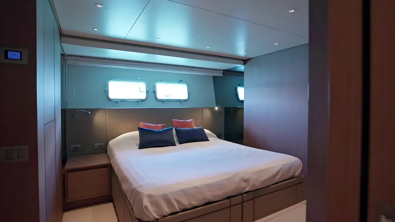 Eight44 Yacht Photos Pics Luxurious bedroom interior of 2025 Sanlorenzo SL90A yacht with modern design and ambient lighting.
