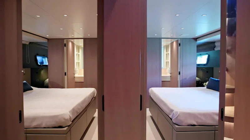 Eight44 Yacht Photos Pics Luxurious bedroom interior of 2025 Sanlorenzo SL90A yacht with modern design and ambient lighting.