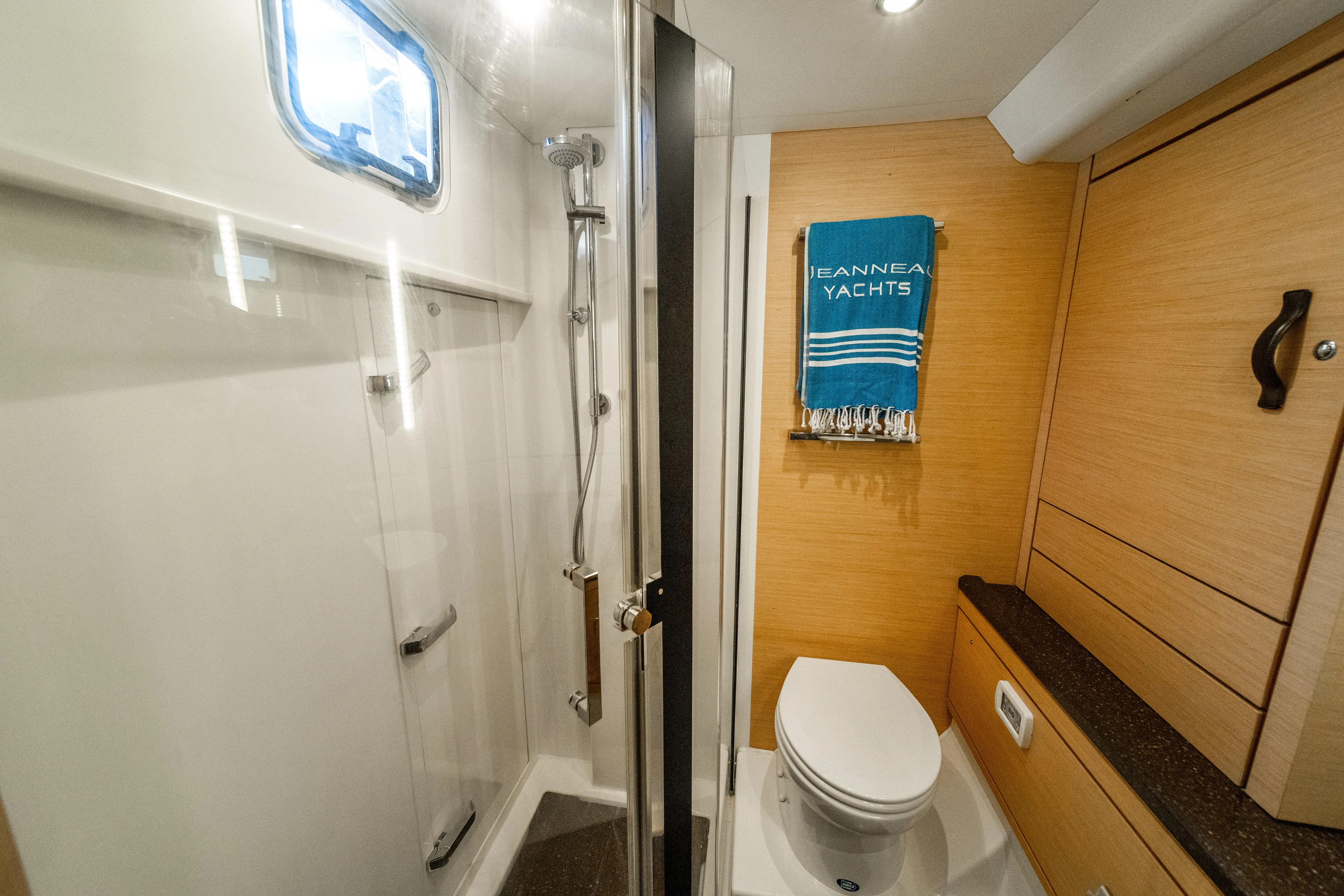 Serenity Yacht Photos Pics Luxurious bathroom in 2016 Jeanneau 64 yacht with shower and toilet.