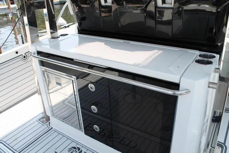 Over Exposed Yacht Photos Pics 2021 Jeanneau Leader 10.5 boat interior with sleek cabinetry and modern design.