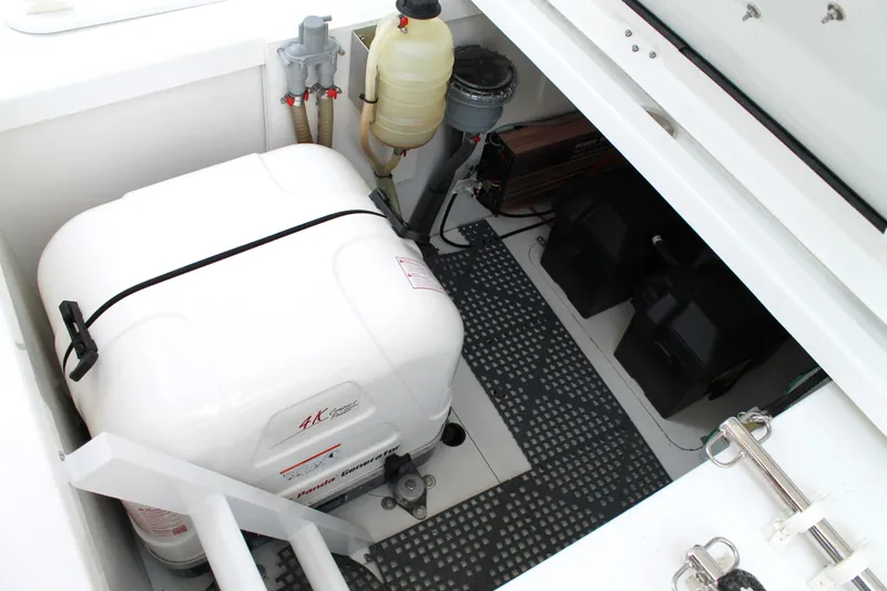 Over Exposed Yacht Photos Pics Engine compartment of 2021 Jeanneau Leader 10.5 with generator and equipment.