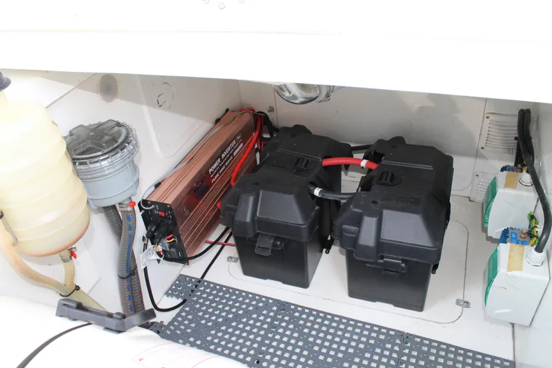 Over Exposed Yacht Photos Pics 2021 Jeanneau Leader 10.5 engine compartment with batteries and equipment.