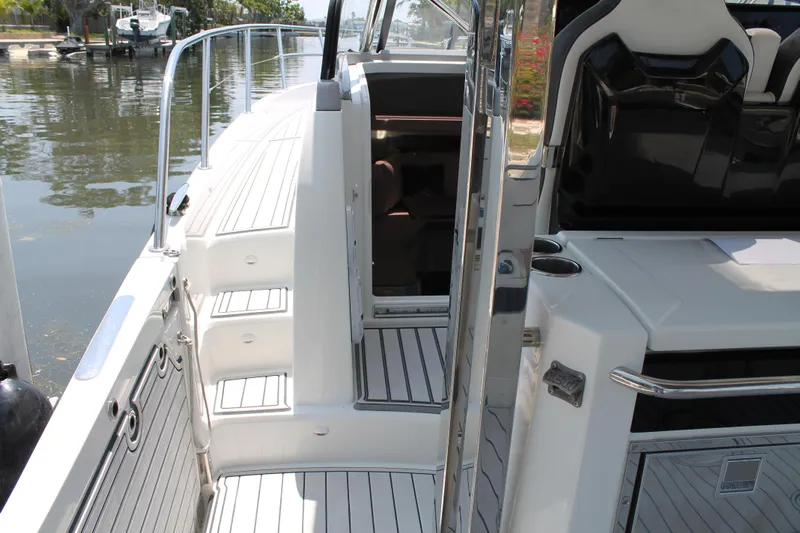 Over Exposed Yacht Photos Pics 2021 Jeanneau Leader 10.5 boat interior with sleek design and modern amenities.