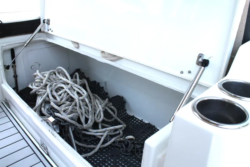 Over Exposed Yacht Photos Pics Storage compartment with ropes on a 2021 Jeanneau Leader 10.5 boat.