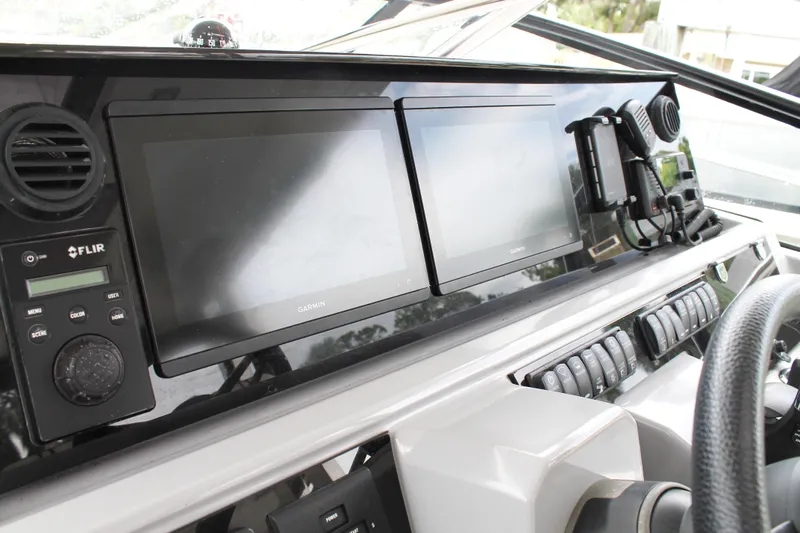 Over Exposed Yacht Photos Pics 2021 Jeanneau Leader 10.5 WA Series 2 dashboard with Garmin displays and FLIR system.