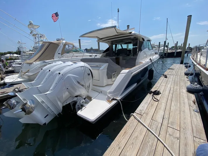  Yacht Photos Pics 2021 Tiara Yachts 43 LE docked with powerful outboard engines.