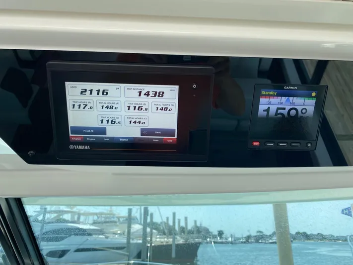  Yacht Photos Pics Yamaha and Garmin displays on 2021 Tiara Yachts 43 LE dashboard.