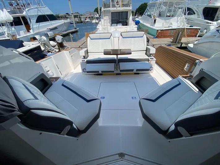  Yacht Photos Pics 2021 Tiara Yachts 43 LE luxury boat interior with plush seating and elegant design.