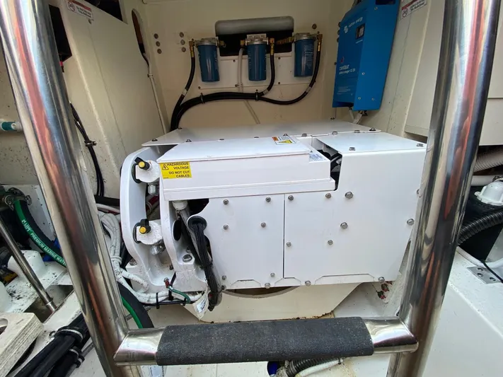  Yacht Photos Pics Engine compartment of 2021 Tiara Yachts 43 LE with visible components and wiring.