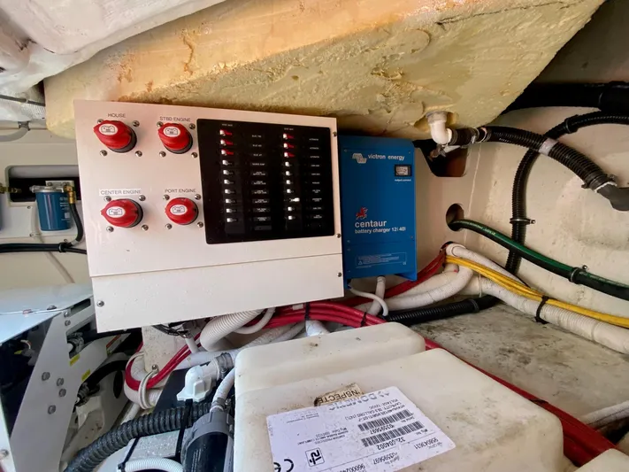  Yacht Photos Pics Electrical panel and battery charger in 2021 Tiara Yachts 43 LE engine room.