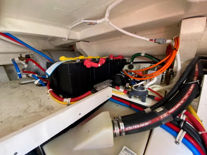  Yacht Photos Pics 2021 Tiara Yachts 43 LE engine compartment with wiring and battery setup.