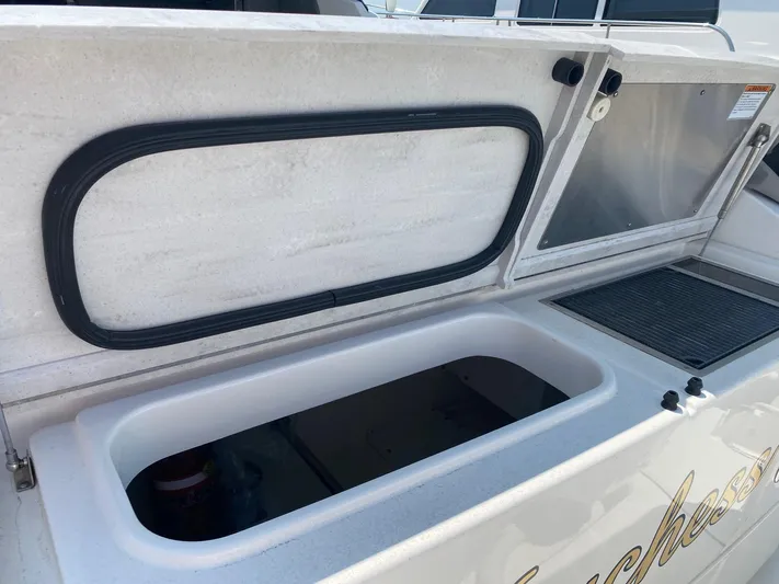  Yacht Photos Pics Open storage compartment on a 2021 Tiara Yachts 43 LE boat.