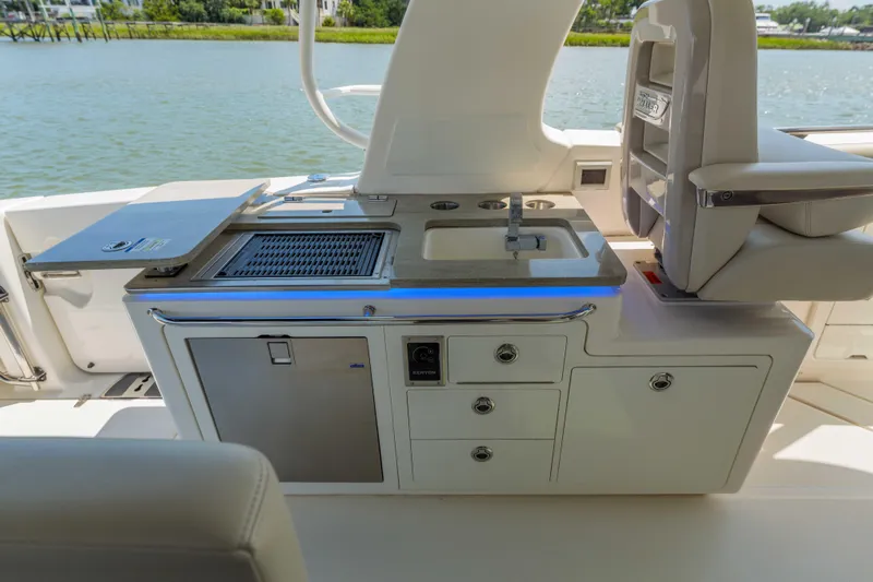 Clay Fam Yacht Photos Pics Boston Whaler 380 Realm- Wet Bar and Storage