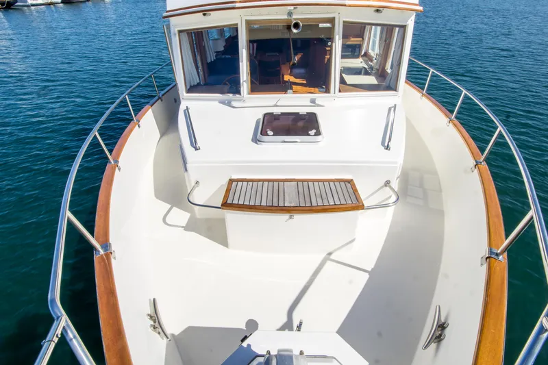 Dauntless Yacht Photos Pics 1995 Grand Banks 42 Classic yacht bow, featuring teak accents and spacious deck.