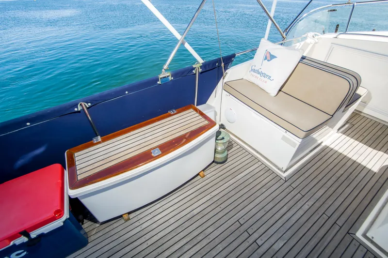 Dauntless Yacht Photos Pics Deck seating area on a 1995 Grand Banks 42 Classic yacht with ocean view.