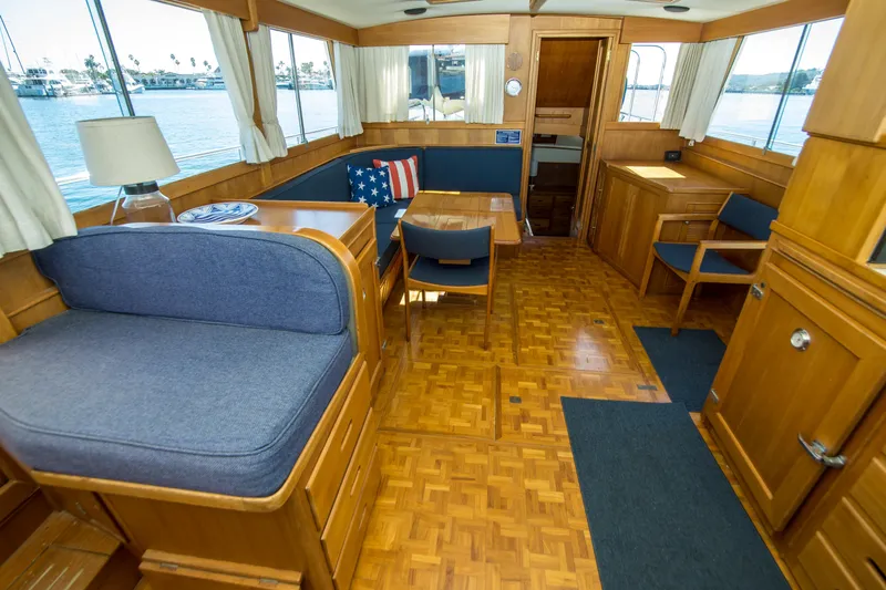 Dauntless Yacht Photos Pics Interior of 1995 Grand Banks 42 Classic yacht with wooden furnishings and nautical decor.