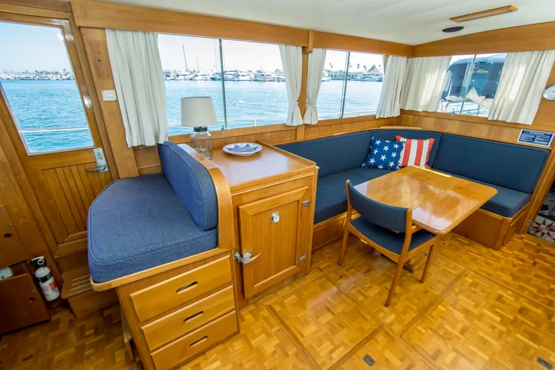 Dauntless Yacht Photos Pics Interior of 1995 Grand Banks 42 Classic yacht with wooden furnishings and nautical decor.