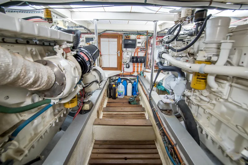 Dauntless Yacht Photos Pics Engine room of a 1995 Grand Banks 42 Classic yacht, showcasing dual engines and equipment.