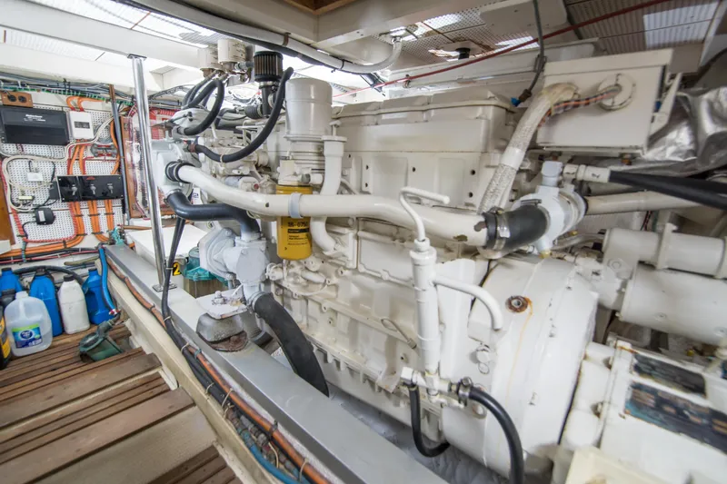 Dauntless Yacht Photos Pics Engine room of a 1995 Grand Banks 42 Classic yacht, showcasing detailed machinery.