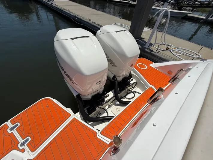  Yacht Photos Pics 2019 Boston Whaler 320 Vantage with dual Mercury outboard engines at dock.