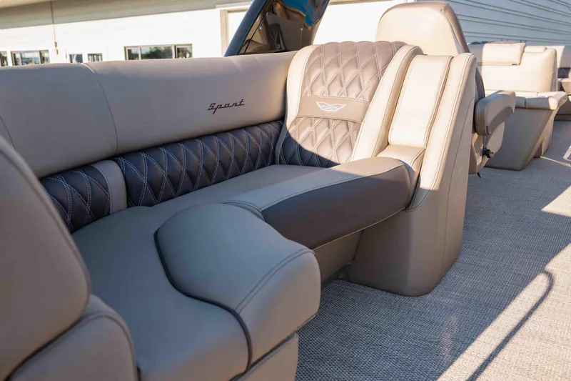  Yacht Photos Pics Luxurious seating on 2023 Bennington R25 FBAST boat with elegant upholstery design.