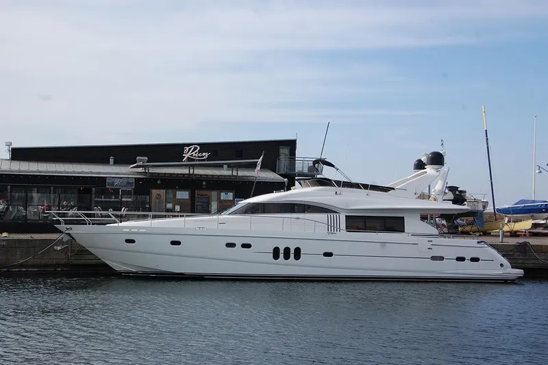  Yacht Photos Pics Luxury 2003 Princess 23m yacht docked at marina, clear sky background.