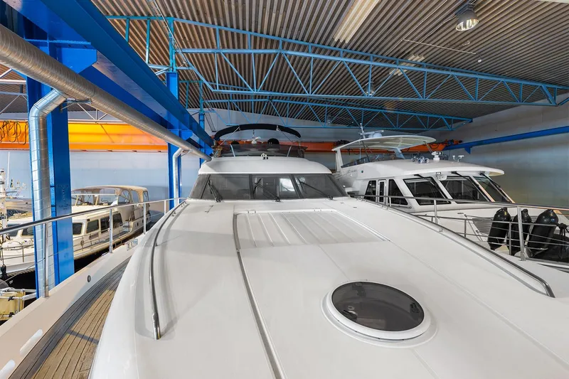  Yacht Photos Pics Luxury Princess 23m yacht from 2003 docked in a spacious indoor marina.