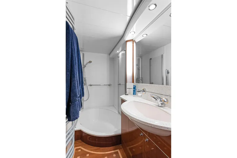  Yacht Photos Pics Luxurious bathroom in 2003 Princess 23m yacht with modern fixtures and elegant design.
