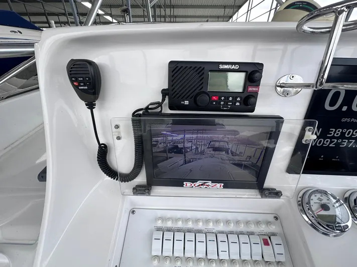  Yacht Photos Pics Control panel of 2008 Donzi 38 ZSF boat with Simrad radio and display screen.