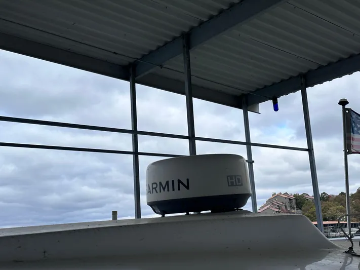  Yacht Photos Pics Garmin radar on 2008 Donzi 38 ZSF boat under cloudy sky.