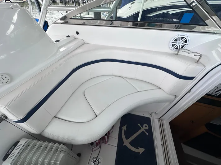  Yacht Photos Pics 2008 Donzi 38 ZSF boat interior with white leather seating and anchor-themed decor.