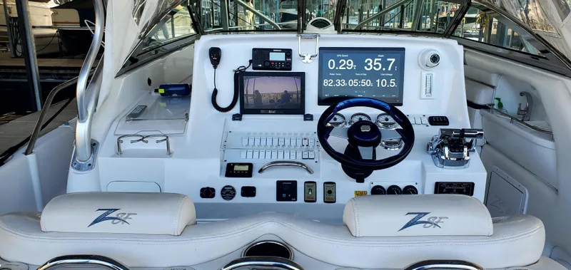  Yacht Photos Pics 2008 Donzi 38 ZSF boat cockpit with advanced navigation controls and seating.