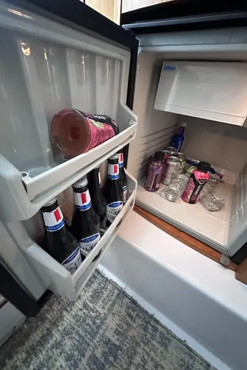  Yacht Photos Pics Mini fridge stocked with drinks inside a 2008 Donzi 38 ZSF boat.