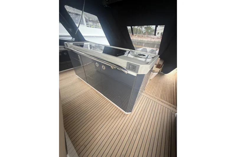  Yacht Photos Pics Luxurious Hanover 447 yacht interior with sleek kitchen area, 2025 model.