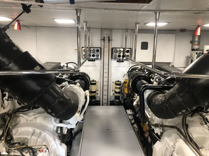 Ocean Delta 11 Yacht Photos Pics Engine room of a 2008 Canados 86 yacht, featuring dual engines and control panels.